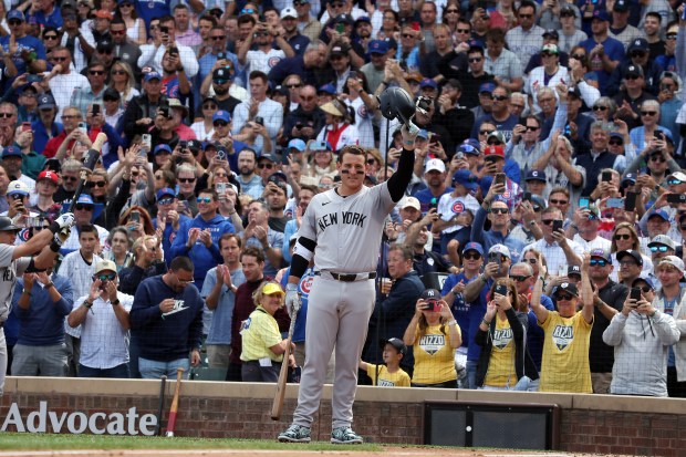 Yankees' Anthony Rizzo salutes the crowd before batting against the Cubs in the second inning at Wrigley Field on Sept. 6, 2024. (Terrence Antonio James/Chicago Tribune)