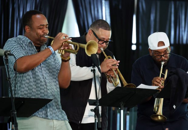The Marques Carroll Trumpet Summit, including Quentin Coaxum, from left, Marques Carroll and Ryan Nyther, performs at the Chicago Jazz Festival in Millennium Park on Aug. 29, 2025. (Terrence Antonio James/Chicago Tribune)