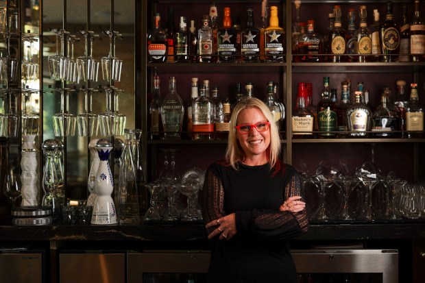 Mixologist Melissa Weaver at the Tavern on Rush bar where she is currently working as a server, Sept. 8, 2025. (Eileen T. Meslar/Chicago Tribune)