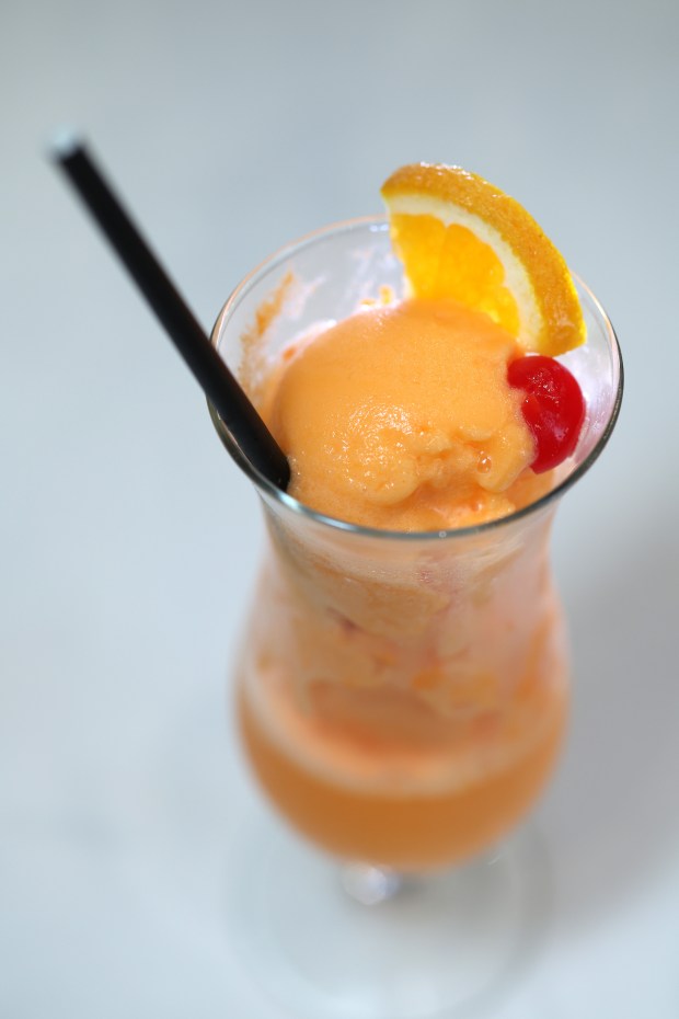 The orange daiquiri cocktail at The Walnut Room came from a previous Marshall Field's menu in the 1970s, Sept. 9, 2025. (Terrence Antonio James/Chicago Tribune)