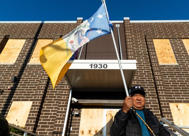 Joaquín Martínez of Des Plaines flies an “Our Lady of...