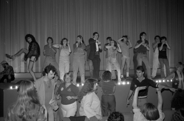 A costumed-clad cast acts out scenes from "The Rocky Horror Picture Show" on Sept. 15, 1980, as the audience joins in at the Biograph Theater, 2433 N. Lincoln Ave. (John Austad/Chicago Tribune)