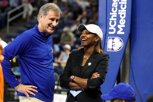 Sky principal owner Michael Alter, left, speaks to co-owner and operating chairman Nadia Rawlinson during halftime of a game against the Atlanta Dream on Aug. 7, 2025, at Wintrust Arena. (Eileen T. Meslar/Chicago Tribune)