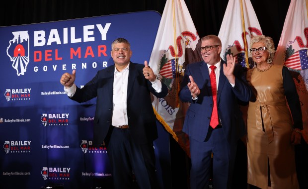 Darren Bailey, center, with running mate Aaron Del Mar and wife Cindy, celebrates his gubernatorial candidacy on Sept. 25, 2025, at the Drake Hotel Oak Brook. (Chris Sweda/Chicago Tribune)
