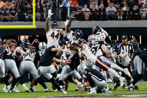 Chicago Bears cornerback Josh Blackwell blocks a kick from Las...