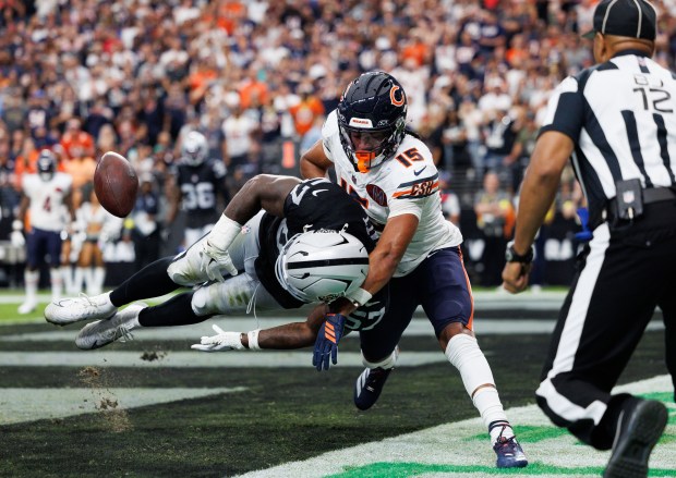 Las Vegas Raiders linebacker Germaine Pratt (57) blocks Chicago Bears...
