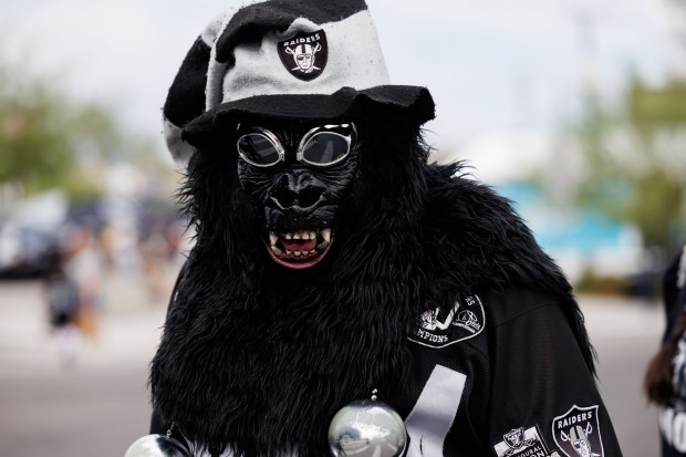 Raiders fans walk outside before the Chicago Bears play the Las Vegas Raiders at Allegiant Stadium, Sept. 28, 2025, in Las Vegas. (Armando L. Sanchez/Chicago Tribune)