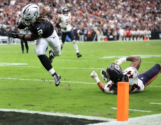 Las Vegas Raiders running back Ashton Jeanty (2) breaks free...