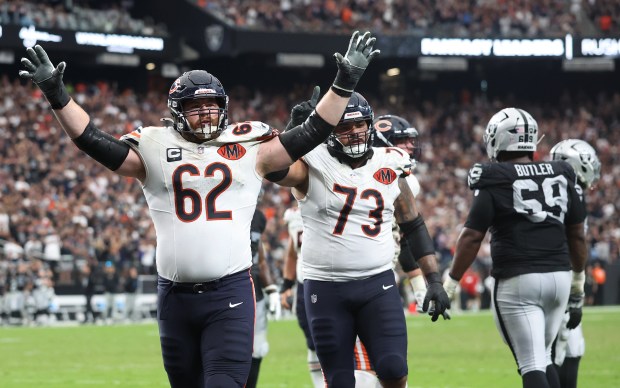 Chicago Bears guard Joe Thuney (62) celebrates after a touchdown...
