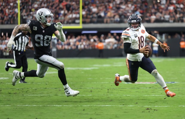Las Vegas Raiders defensive end Maxx Crosby (98) pursues Chicago...