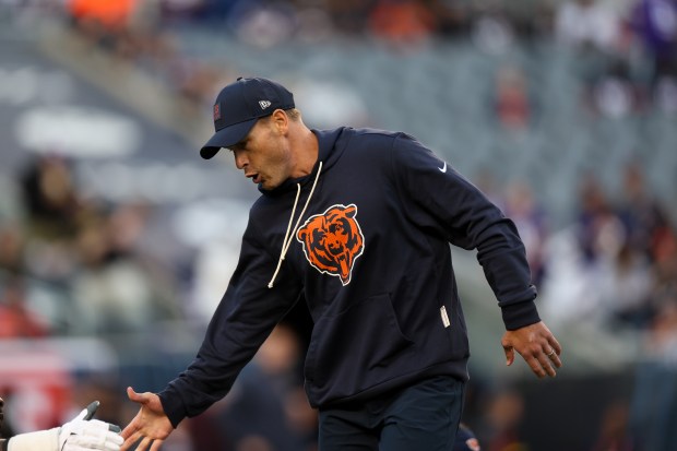 Chicago Bears head coach Ben Johnson walks on the field before the Bears play the Minnesota Vikings at Soldier Field on Sept. 8, 2025, in Chicago. (Armando L. Sanchez/Chicago Tribune)