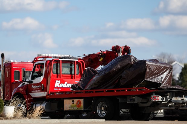 The 1980 Toyota Celica driven by Karen Schepers is towed...