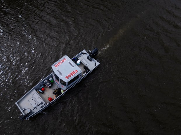 Elgin police and Chaos Divers use sonar to search for...