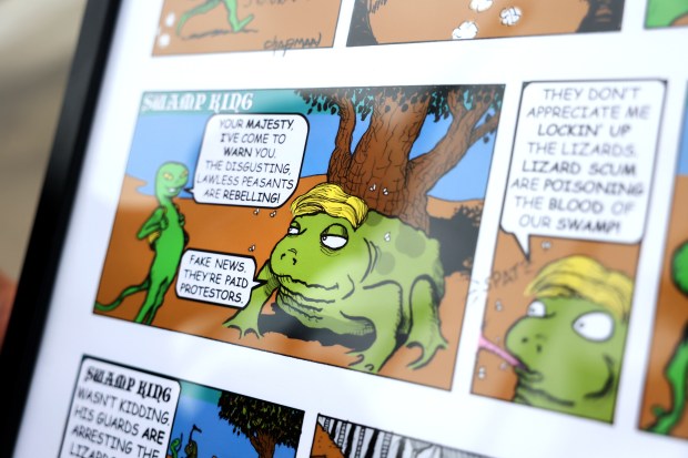 Tim Chapman's "SWAMP KING" comic was among artwork pulled from display at the Austin-Irving branch of the Chicago Public Library. Chapman's artwork, and other pieces created by different artists, was on display at the branch in Chicago's Portage Park neighborhood for over two months. (Chris Sweda/Chicago Tribune)