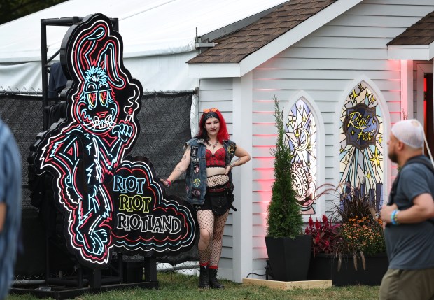 A music fan poses for a photograph at Riot Fest in Chicago's Douglass Park on Friday, Sept. 19, 2025. (Chris Sweda/Chicago Tribune)