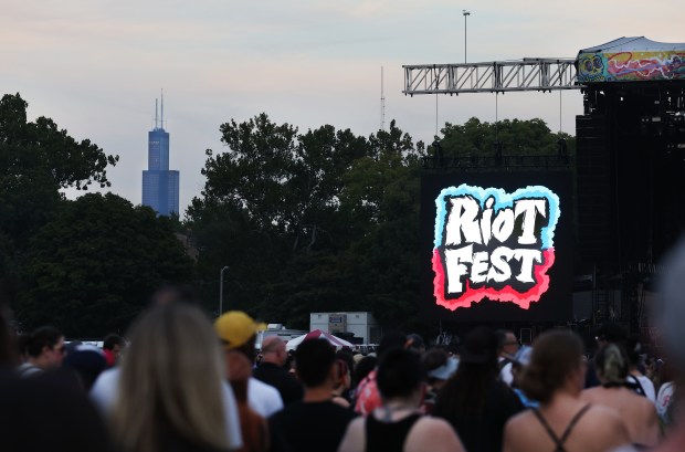 The Willis Tower in downtown Chicago is seen in the distance as Riot Fest takes place at Douglass Park on Friday, Sept. 19, 2025. (Chris Sweda/Chicago Tribune)