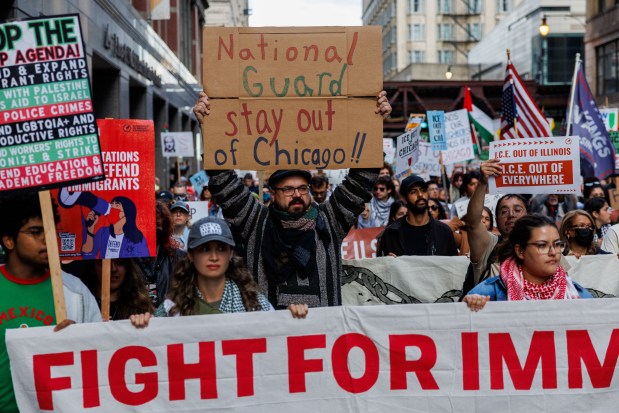 People march in the Loop to protest President Donald Trump's intent to increase immigration enforcement actions in the city and deploy the National Guard, Sept. 6, 2025, in Chicago. (Armando L. Sanchez/Chicago Tribune)
