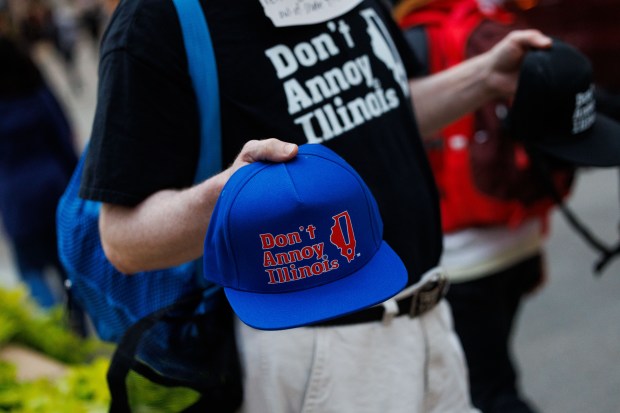 People march along North Michigan Avenue to protest President Donald Trump's intent to increase immigration enforcement actions in the city and deploy the National Guard, Sept. 6, 2025, in Chicago. (Armando L. Sanchez/Chicago Tribune)