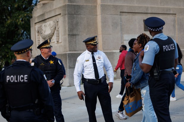 Superintendent Larry Snelling stands with other officers while people gather near the Congress Plaza Gardens to protest President Donald Trump's intent to increase immigration enforcement actions in the city and deploy the National Guard, Sept. 6, 2025, in Chicago. (Armando L. Sanchez/Chicago Tribune)