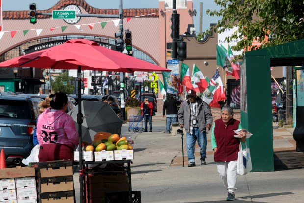 Vendors sell their products in Chicago's Little Village Sept. 9, 2025. (Antonio Perez/Chicago Tribune)