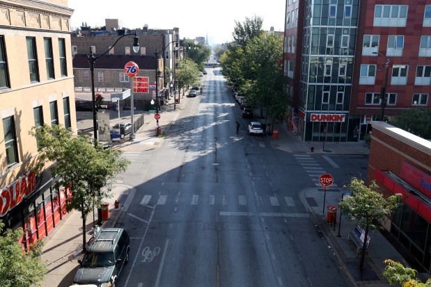 Streets are nearly empty of vehicles, pedestrians or street vendors along 18th Street near a a CTA train station in Chicago's Pilsen neighborhood, Sept. 17, 2025. (Antonio Perez/Chicago Tribune)