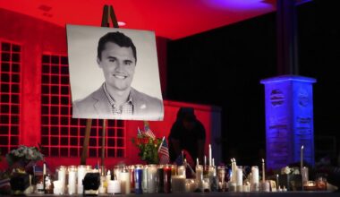 A photo of Charlie Kirk, the CEO and co-founder of Turning Point USA who was shot and killed, stands at his vigil, Thursday, Sept. 11, 2025, in Orem, Utah. (AP Photo/Lindsey Wasson)