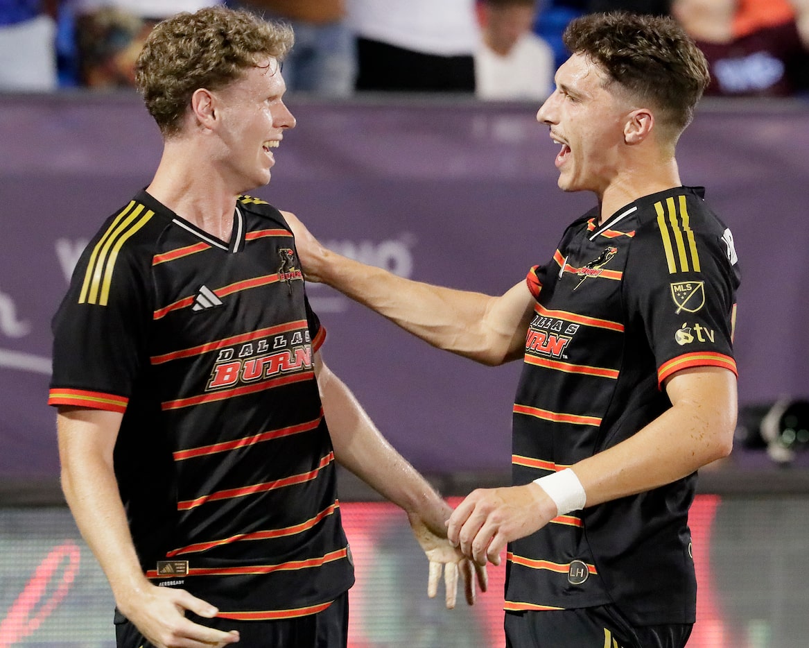 FC Dallas midfielder Christian Cappis (12) is congratulated by FC Dallas forward Logan...