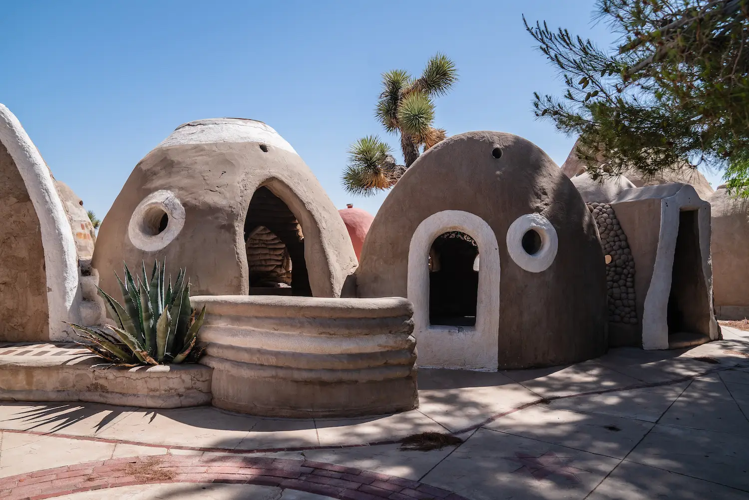Exterior of CalEarth SuperAdobe fire-resistant home structures based on indigenous homes 