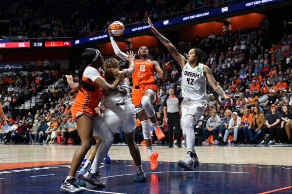 Atlanta Dream center Brittney Griner (42) defends against Connecticut Sun forward Aaliyah Edwards (8) during the second half at Mohegan Sun Arena.