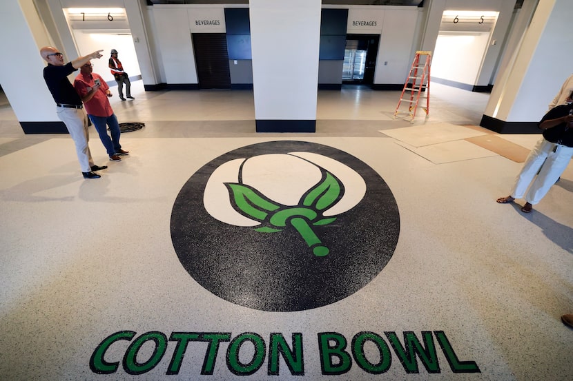 The original Cotton Bowl logo at the main entrance has been restored as part of Cotton Bowl...
