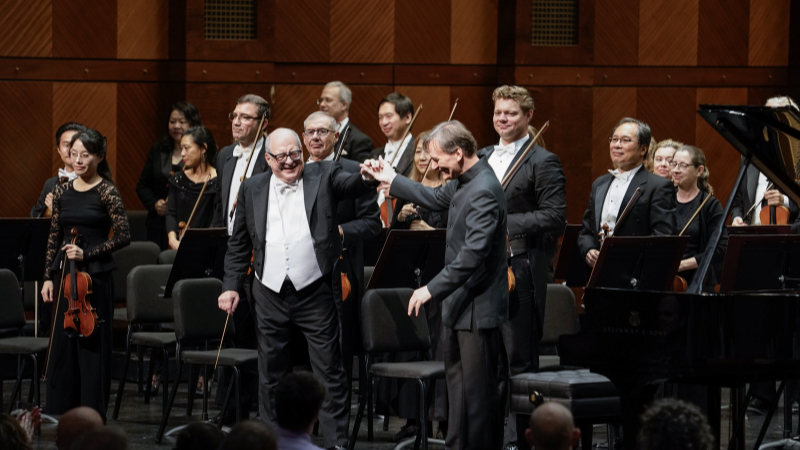 Music director Robert Spano, pianist Stephen Hough, and the Fort Worth Symphony Orchestra take a bow following Grieg's 'Piano Concerto in A minor.' (credit: Karen Almond)