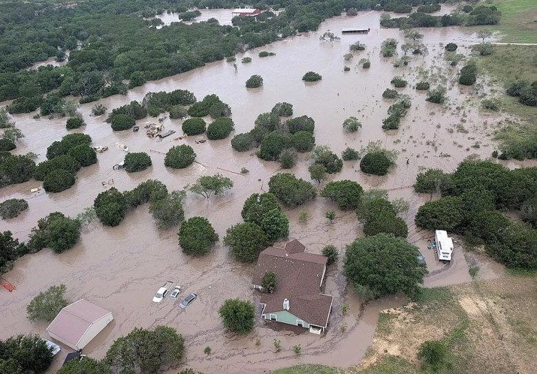 Flood waters from the Guadalupe River surround homes near Kerrville on July 4, 2025.