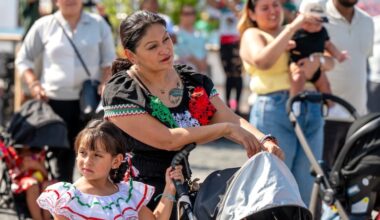 Lucia Ramirez, with her daughters Lexi and Gianna (in the stroller) watch performances onstage at the Mexican Independence Day Festival at the Independence Blue Cross RiverRink at Penn’s Landing Sunday, Sept. 14, 2025.