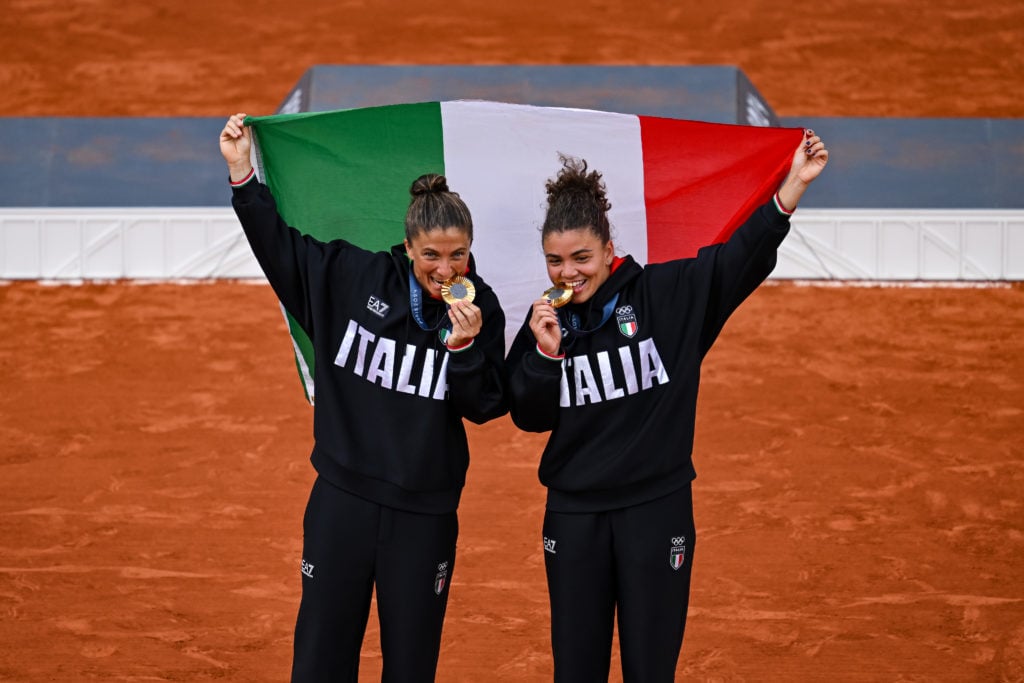 Sara Errani and Jasmine Paolini celebrate their gold medals at the 2024 Olympics