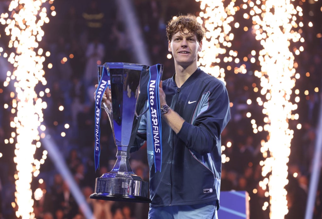 Jannik Sinner celebrates with the ATP Finals title in 2024