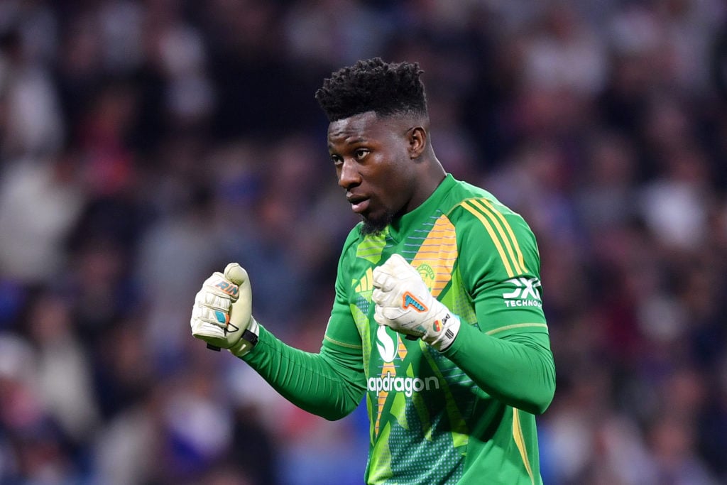 Manchester United goalkeeper Andre Onana facing Lyon.