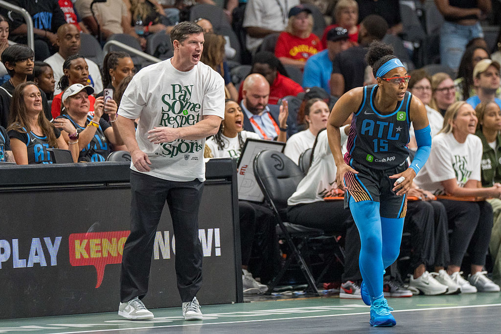 Head coach Karl Smesko yells a play to Allisha Gray #15 of the Atlanta Dream during the first quarter of a game between the Indiana Fever and Atlanta Dream at State Farm Arena on May 22, 2025 in Atlanta, Georgia.