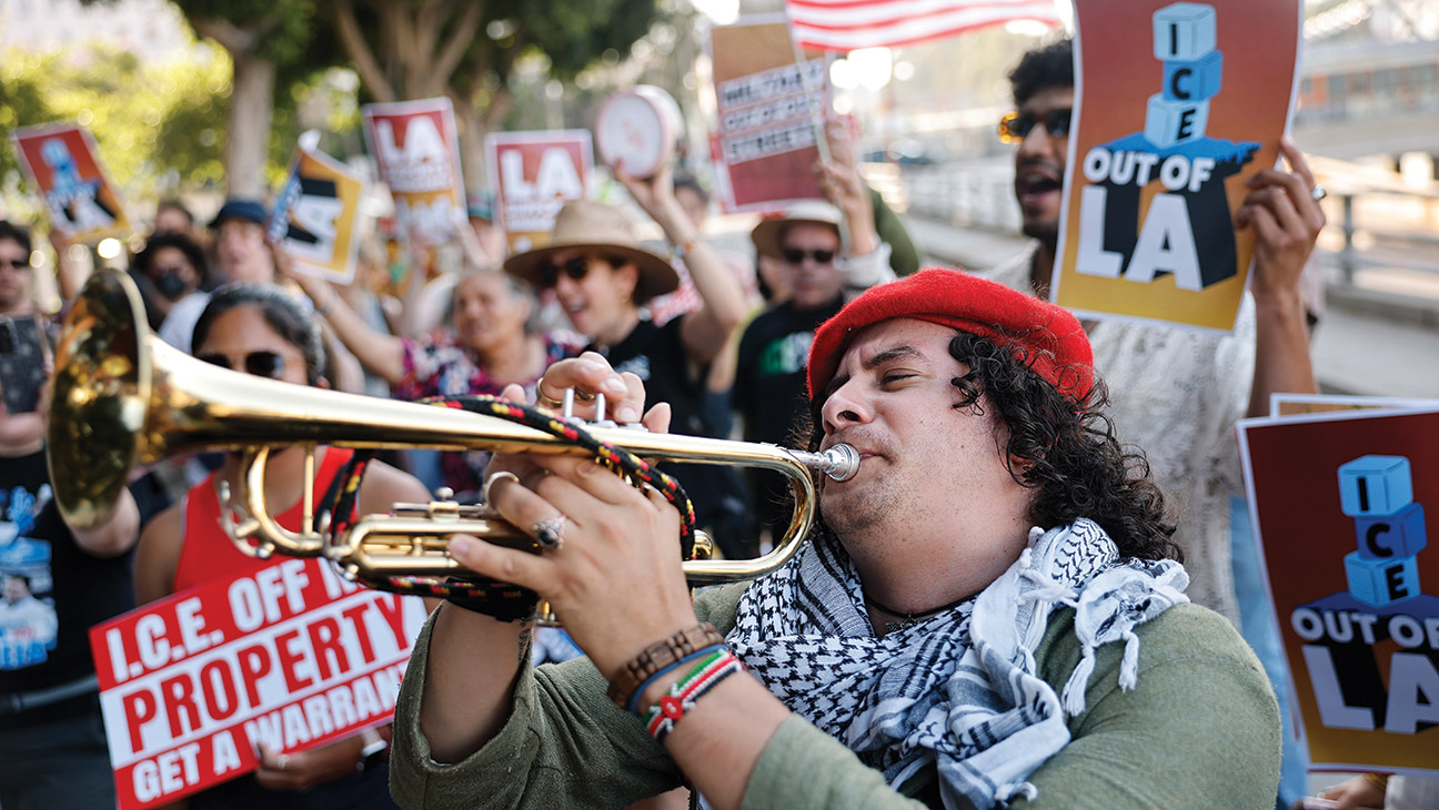 Demonstrators protest raids by the Immigration and Customs Enforcement in Los Angeles in June.