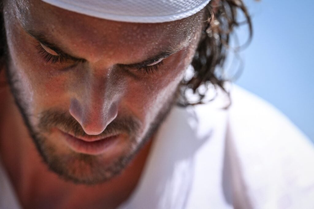 Stefanos Tsitsipas reacts during his defeat to Valentin Royer at Wimbledon.