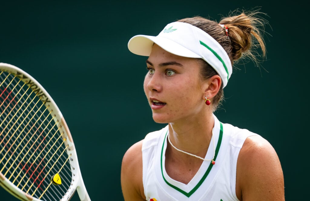 Iva Jovic of the United States in action against Suzan Lamens of the Netherlands in the first round on Day Two of The Championships Wimbledon 2025 at All England Lawn Tennis and Croquet Club.
