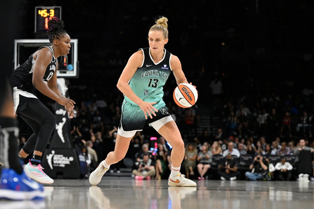 Leonie Fiebich handles the ball during the game against the Las Vegas Aces on August 13, 2025 at Michelob ULTRA Arena in Las Vegas, Nevada.