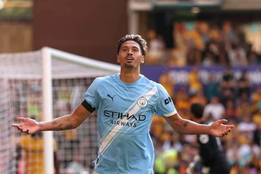 Tijjani Reijnders celebrates scoring on his Premier League debut against Wolves