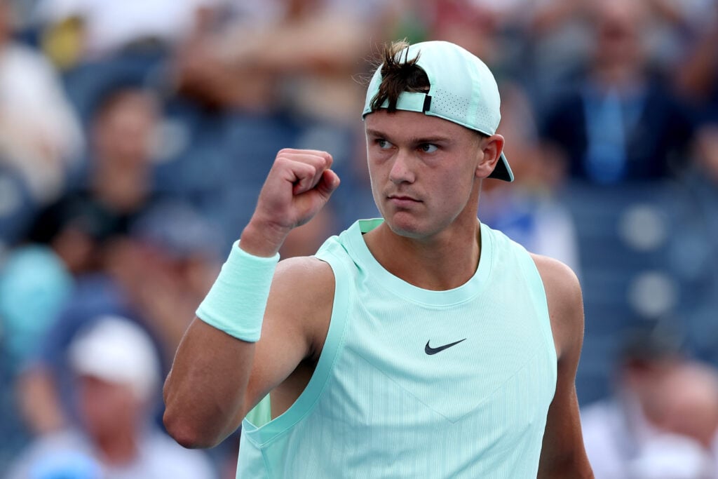Holger Rune of Denmark reacts against Botic van De Zandschulp of the Netherlands during their Men's Singles First Round match on Day Two of the 2025 US Open at USTA Billie Jean King National Tennis Center.