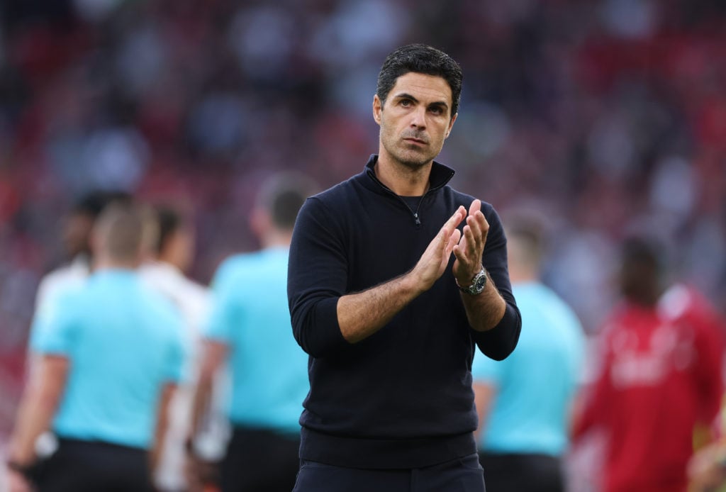 Mikel Arteta applauds after Liverpool v Arsenal