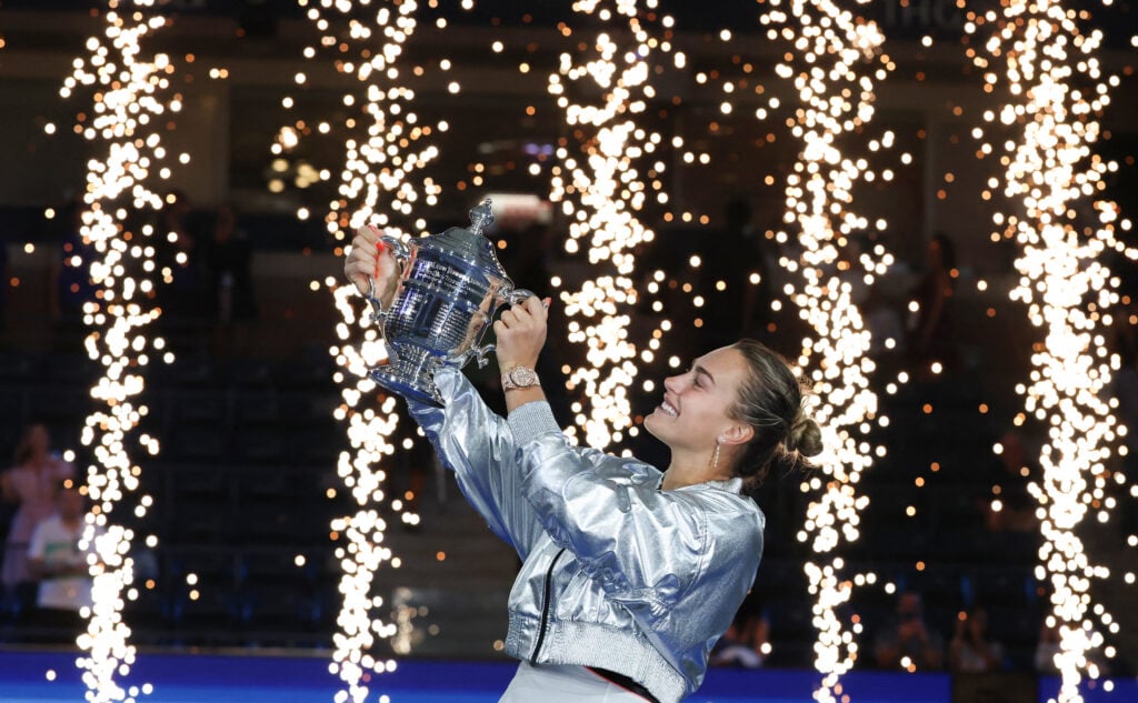 Aryna Sabalenka holding the US Open title.