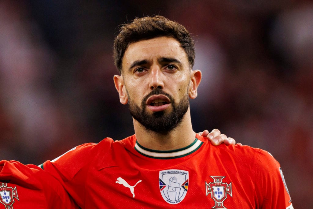 Manchester United midfielder Bruno Fernandes sings his national anthem prior to the FIFA World Cup 2026 qualifier match between Hungary and Portugal at Puskas Arena in 2025 in Budapest, Hungary.