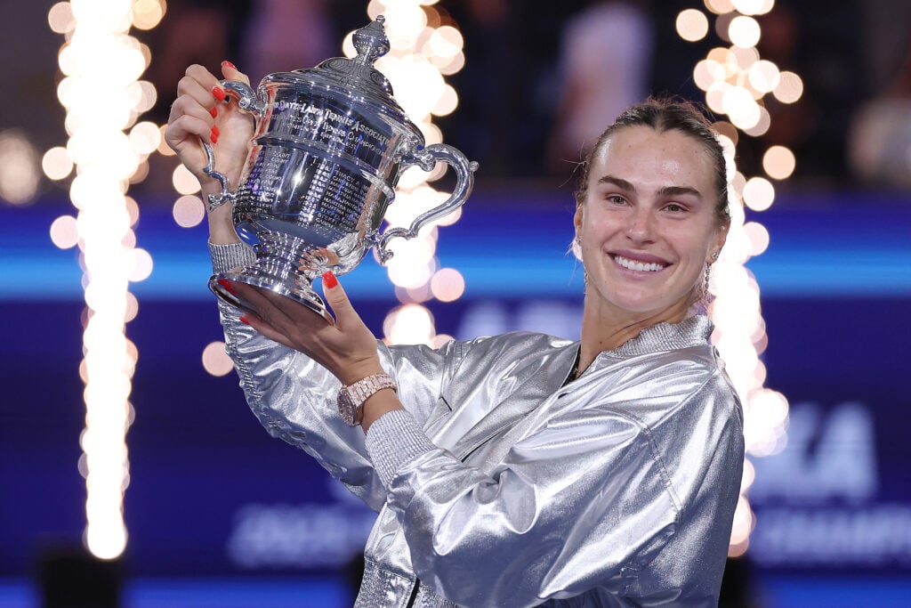 Aryna Sabalenka poses with her trophy after defeating Amanda Anisimova of the United States during their Women's Singles Final match on Day Fourteen of the 2025 US Open at USTA Billie Jean King National Tennis Center.