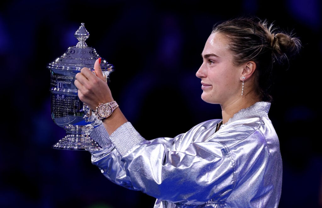 Aryna Sabalenka poses with her trophy after defeating Amanda Anisimova of the United States during their Women's Singles Final match on Day Fourteen of the 2025 US Open at USTA Billie Jean King National Tennis Center.
