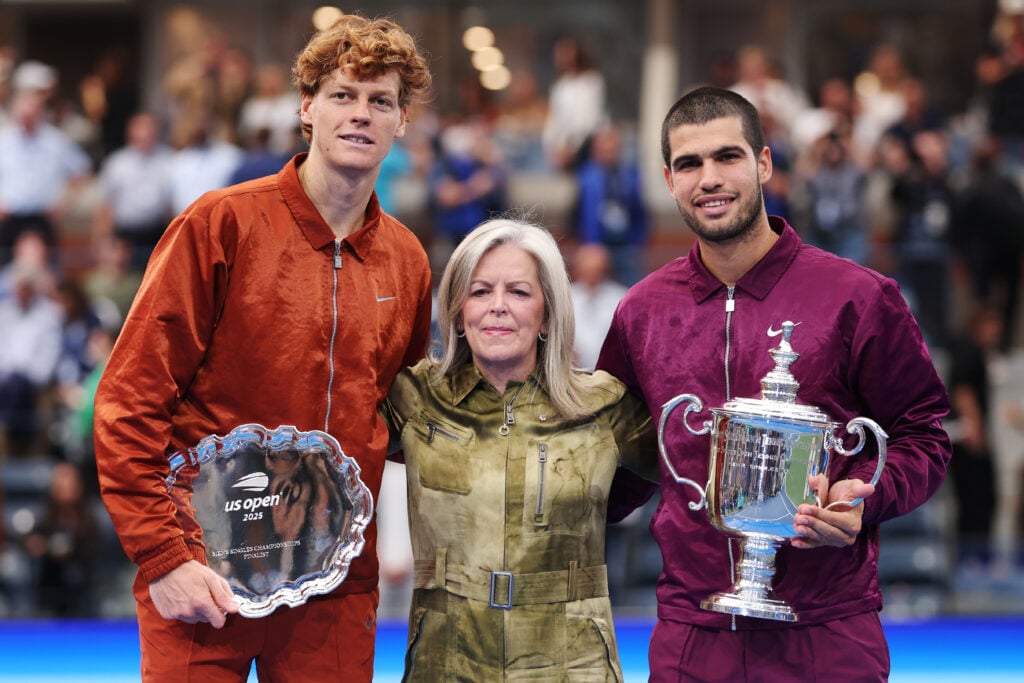 Jannik Sinner of Italy, Stacey Allaster Chief Executive of Professional Tennis and US Open Tournament Director, Carlos Alcaraz of Spain pose with their trophies after defeating during their Men's Singles Final match on Day Fifteen of the 2025 US Open at USTA Billie Jean King National Tennis Center.