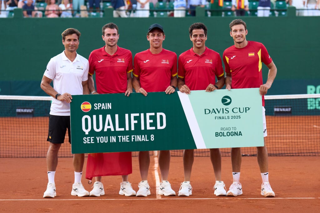 David Ferrer, Pedro Martinez, Roberto Carballes Baena, Jaume Munar and Pablo Carreño Busta of Spain celebrate with banner